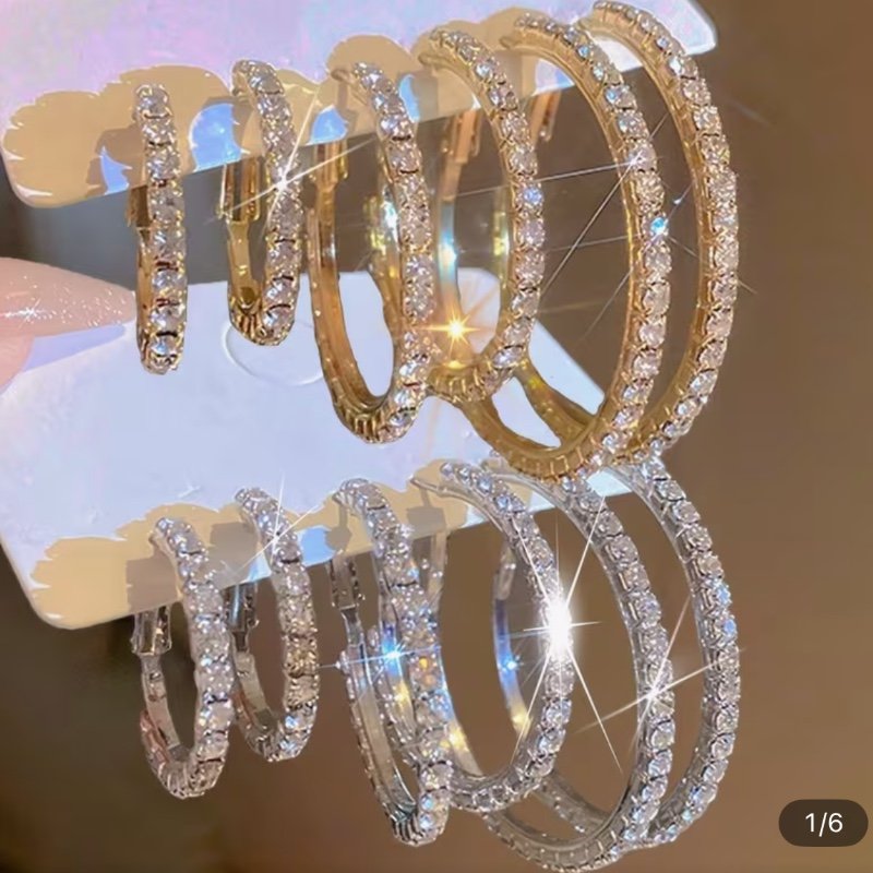 Boucle d’oreille ➿